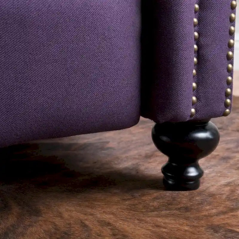 Fauteuil inclinable en tissu capitonné avec accents rivetées