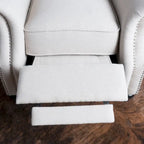 Fauteuil inclinable en tissu capitonné avec accents rivetées
