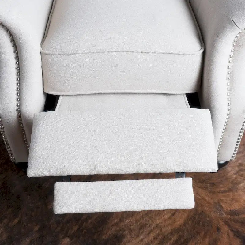 Fauteuil inclinable en tissu capitonné avec accents rivetées