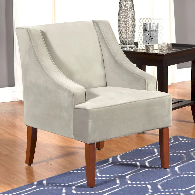 Fauteuil d'appoint en velours gris tourterelle avec accoudoirs incurvés