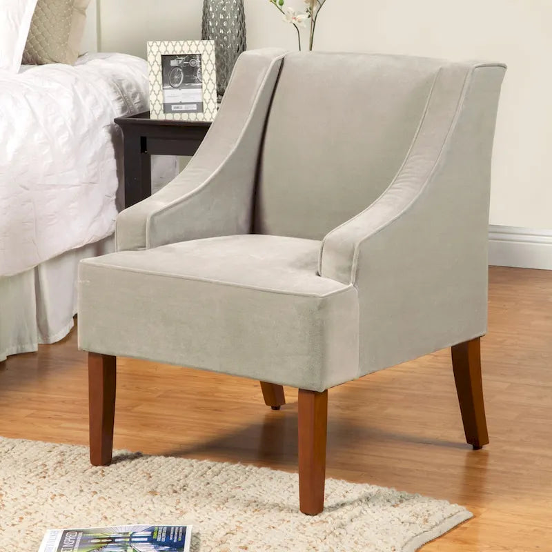 Fauteuil d'appoint en velours gris tourterelle avec accoudoirs incurvés